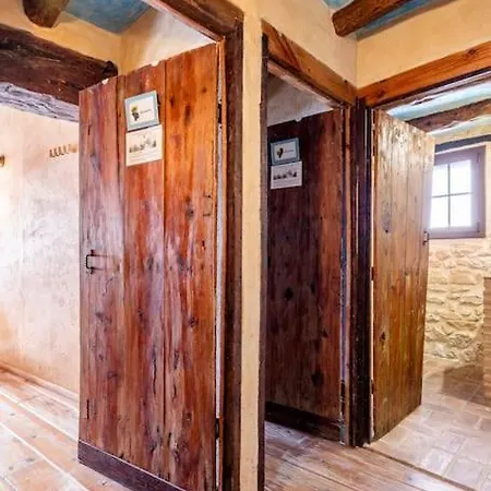 Casa de camp Can Miqueló - gran casa rural 16 hostes Prat de Comte